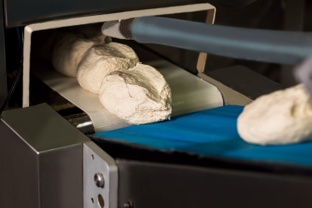 dough on the conveyor belt